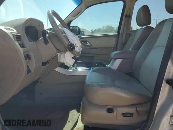 2007 Mercury Mariner Premier with VIN 4M2CU97197KJ07237, listed as a Copart auction lot 81430055 with 78,917 mi miles and Salvage title. Bid and sale history available at DreamBid. Image 7.