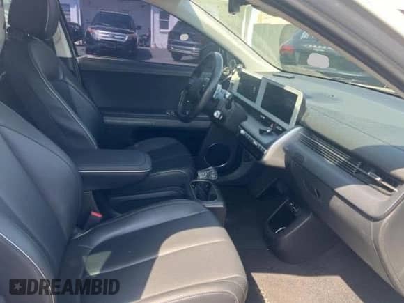 2022 Hyundai Ioniq 5 SEL с VIN KM8KN4AE5NU082069, выставлен на аукционе Copart как лот 84011235 с пробегом 83 713 миль миль и Чистый • Clean title. История ставок и продаж доступна на DreamBid. Изображение 5.