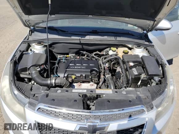 2014 Chevrolet Cruze 1LT z VIN 1G1PC5SB5E7218492, wystawiony jako Copart lot #70284915 z przebiegiem 170 608 mil mil oraz Szkoda całkowita • Salvage title. Historia ofert i sprzedaży dostępna na DreamBid. Obrazek 11.