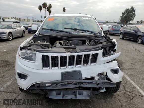 2014 Jeep Grand Cherokee Laredo with VIN 1C4RJEAG4EC265653, listed as a Copart auction lot 84594325 with Not provided miles and Salvage title. Bid and sale history available at DreamBid. Image 5.