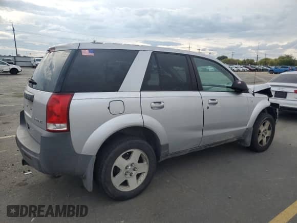 2004 Saturn VUE V6 with VIN 5GZCZ634X4S871016, listed as a Copart auction lot 82094855 with 171,200 mi miles and Salvage title. Bid and sale history available at DreamBid. Image 3.