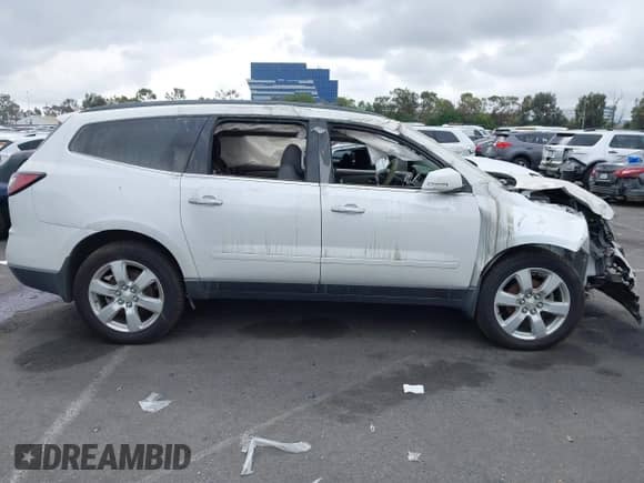 2017 Chevrolet Traverse LT z VIN 1GNKRGKD2HJ187505, wystawiony jako IAAI lot #43299284 z przebiegiem 80 256 mil mil oraz . Historia ofert i sprzedaży dostępna na DreamBid. Obrazek 14.