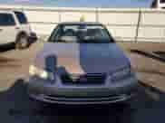 2001 Toyota Camry LE z VIN 4T1BG22K01U058520, wystawiony jako Copart lot #85351165 z przebiegiem 196 747 mil mil oraz Szkoda całkowita • Salvage title. Historia ofert i sprzedaży dostępna na DreamBid. Obrazek 5.