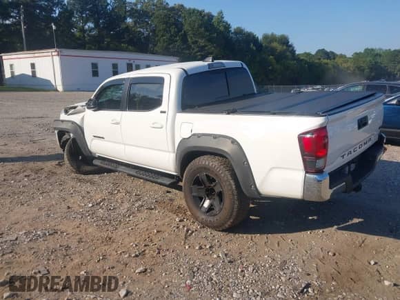 2021 Toyota Tacoma SR5 with VIN 3TMAZ5CN8MM152710, listed as a IAAI auction lot 43148239 with 40,000 mi miles and . Bid and sale history available at DreamBid. Image 3.
