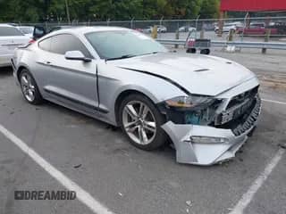 2019 Ford Mustang EcoBoost with VIN 1FA6P8THXK5123113, listed as a IAAI auction lot 43195394 with 89,203 mi miles and . Bid and sale history available at DreamBid. Image 1.