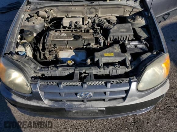 2005 Hyundai Accent GLS с VIN KMHCG45C95U665574, выставлен на аукционе Copart как лот 82603804 с пробегом 154 187 миль миль и Списание • Salvage title. История ставок и продаж доступна на DreamBid. Изображение 12.