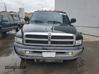 1999 Dodge 3500 z VIN 1B7MC3361XJ624548, wystawiony jako Copart lot #77225594 z przebiegiem 193 623 mil mil oraz Szkoda całkowita • Salvage title. Historia ofert i sprzedaży dostępna na DreamBid. Obrazek 5.