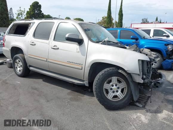 2007 Chevrolet Suburban LT with VIN 3GNFC16057G265038, listed as a IAAI auction lot 43219448 with 221,038 mi miles and . Bid and sale history available at DreamBid. Image 1.
