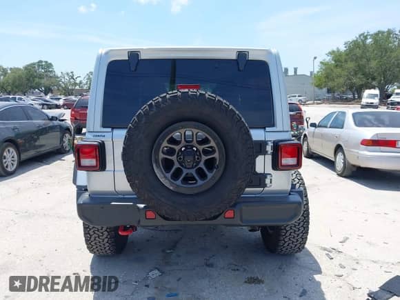 2023 Jeep Wrangler Rubicon with VIN 1C4JJXFG0PW522651, listed as a IAAI auction lot 42112210 with 7,744 mi miles and . Bid and sale history available at DreamBid. Image 17.