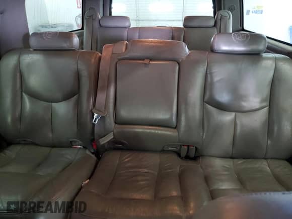 2004 Cadillac Escalade ESV z VIN 3GYFK66N04G233866, wystawiony jako Copart lot #64982075 z przebiegiem 204 562 mil mil oraz Czysty tytuł • Clean title. Historia ofert i sprzedaży dostępna na DreamBid. Obrazek 10.