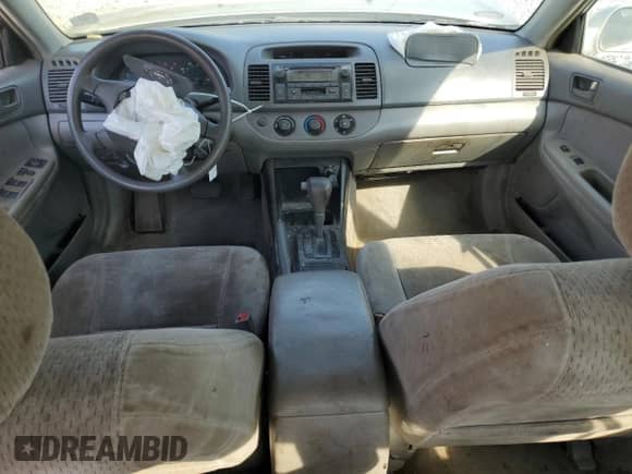 2003 Toyota Camry LE с VIN 4T1BE32K83U762382, выставлен на аукционе Copart как лот 81790015 с пробегом 196 228 миль миль и Списание • Salvage title. История ставок и продаж доступна на DreamBid. Изображение 8.