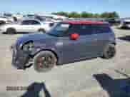 2016 MINI Hardtop John Cooper Works with VIN WMWXM9C53GT997497, listed as a Copart auction lot 56387615 with 59,852 mi miles and Salvage title. Bid and sale history available at DreamBid. Image 1.