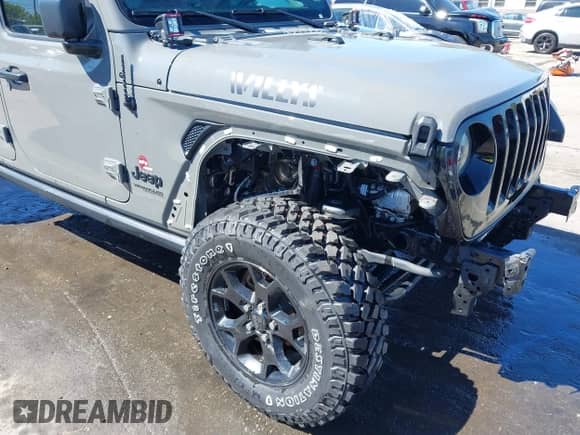 2022 Jeep Wrangler Unlimited Sport S z VIN 1C4HJXDG1NW200793, wystawiony jako IAAI lot #41810817 z przebiegiem 35 212 mil mil oraz . Historia ofert i sprzedaży dostępna na DreamBid. Obrazek 17.