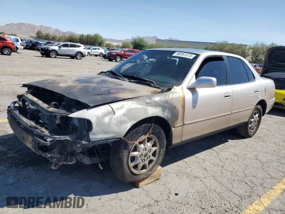 1995 Toyota Camry LE z VIN JT2SK12E4S0292376, wystawiony jako Copart lot #80361575 z przebiegiem 283 257 mil mil oraz Nie do naprawy • Non repairable. Historia ofert i sprzedaży dostępna na DreamBid. Obrazek 1.
