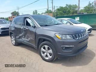 2021 Jeep Compass Latitude with VIN 3C4NJDBBXMT595716, listed as a IAAI auction lot 42498300 with 77,781 mi miles and . Bid and sale history available at DreamBid. Image 1.