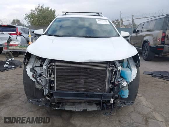 2018 Chevrolet Equinox LT с VIN 2GNAXJEV0J6352926, выставлен на аукционе IAAI как лот 43259696 с пробегом 70 395 миль миль и . История ставок и продаж доступна на DreamBid. Изображение 13.