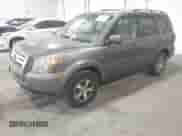 2007 Honda Pilot EX with VIN 5FNYF18407B016273, listed as a IAAI auction lot 43213094 with 252,573 mi miles and . Bid and sale history available at DreamBid. Image 2.