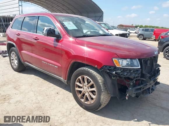 2014 Jeep Grand Cherokee Laredo with VIN 1C4RJEAGXEC473164, listed as a IAAI auction lot 42928191 with 143,889 mi miles and . Bid and sale history available at DreamBid. Image 1.