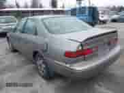 1997 Toyota Camry LE z VIN 4T1BF22K7VU035485, wystawiony jako IAAI lot #41896227 z przebiegiem 254 139 mil mil oraz . Historia ofert i sprzedaży dostępna na DreamBid. Obrazek 3.
