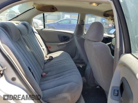 2003 Chevrolet Malibu z VIN 1G1ND52J03M656296, wystawiony jako Copart lot #63408984 z przebiegiem 273 888 mil mil oraz Szkoda całkowita • Salvage title. Historia ofert i sprzedaży dostępna na DreamBid. Obrazek 10.