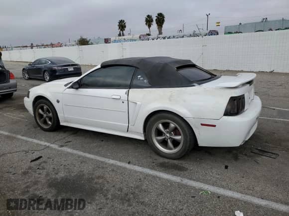 2004 Ford Mustang Deluxe с VIN 1FAFP44454F123067, выставлен на аукционе Copart как лот 86784474 с пробегом 161 541 миль миль и Списание • Salvage title. История ставок и продаж доступна на DreamBid. Изображение 2.