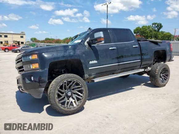 2018 Chevrolet Silverado 2500HD High Country с VIN 1GC1KXEY9JF101557, выставлен на аукционе Copart как лот 65374345 с пробегом Не указан миль и Списание • Salvage title. История ставок и продаж доступна на DreamBid. Изображение 1.