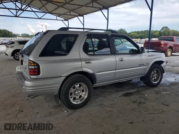 2000 Honda Passport LX with VIN 4S6CK58W3Y4401322, listed as a Copart auction lot 70466595 with 189,630 mi miles and Salvage title. Bid and sale history available at DreamBid. Image 3.