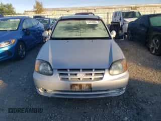 2004 Hyundai Accent GL с VIN KMHCG35C44U284868, выставлен на аукционе Copart как лот 74054884 с пробегом 87 259 миль миль и Чистый • Clean title. История ставок и продаж доступна на DreamBid. Изображение 5.