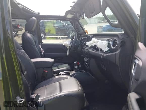 2022 Jeep Wrangler Unlimited Sahara Altitude with VIN 1C4HJXEG3NW194042, listed as a IAAI auction lot 42643314 with 32,091 mi miles and . Bid and sale history available at DreamBid. Image 5.