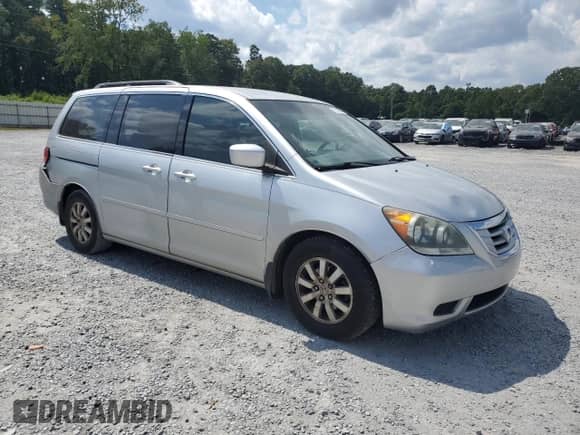 2010 Honda Odyssey EX с VIN 5FNRL3H42AB043863, выставлен на аукционе Copart как лот 71588935 с пробегом 200 740 миль миль и Списание • Salvage title. История ставок и продаж доступна на DreamBid. Изображение 4.