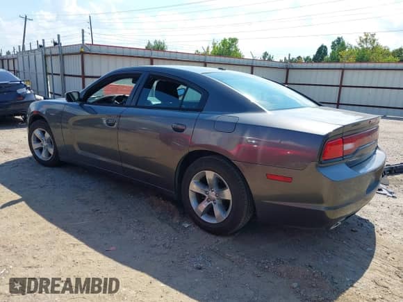 2014 Dodge Charger SXT with VIN 2C3CDXHG0EH258716, listed as a IAAI auction lot 43128720 with 155,555 mi miles and . Bid and sale history available at DreamBid. Image 3.