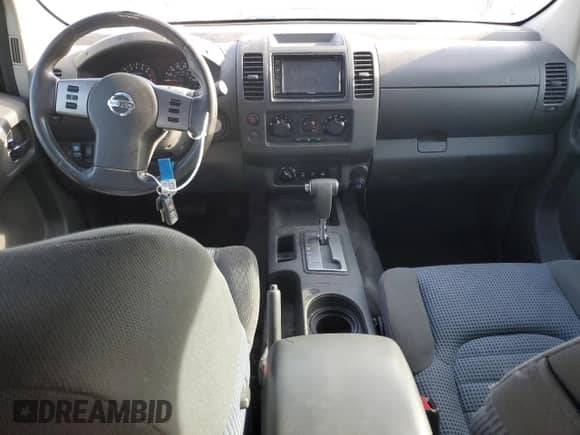 2005 Nissan Frontier Nismo with VIN 1N6AD07W65C406340, listed as a Copart auction lot 84442064 with 199,868 mi miles and Salvage title. Bid and sale history available at DreamBid. Image 8.