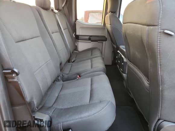 2020 Ford F-150 XL z VIN 1FTFX1E53LFA53471, wystawiony jako Copart lot #71716175 z przebiegiem 146 694 mil mil oraz Czysty tytuł • Clean title. Historia ofert i sprzedaży dostępna na DreamBid. Obrazek 10.