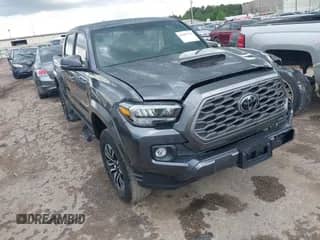 2022 Toyota Tacoma SR5 with VIN 3TMAZ5CN6NM186713, listed as a IAAI auction lot 42607719 with 60,704 mi miles and . Bid and sale history available at DreamBid. Image 1.