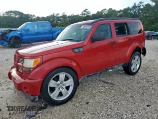 2011 Dodge Nitro Heat with VIN 1D4PT4GK3BW603211, listed as a Copart auction lot 68640995 with 123,916 mi miles and Salvage title. Bid and sale history available at DreamBid. Image 1.