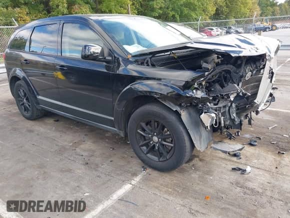 2015 Dodge Journey American Value z VIN 3C4PDCAB6FT531607, wystawiony jako IAAI lot #43454375 z przebiegiem 170 540 mil mil oraz . Historia ofert i sprzedaży dostępna na DreamBid. Obrazek 1.