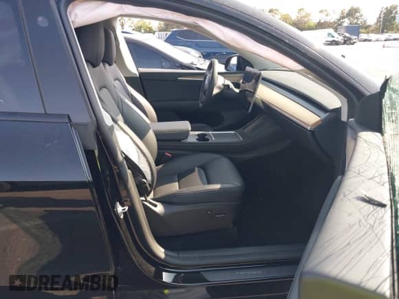 2023 Tesla Model Y Long Range z VIN 7SAYGAEE9PF851348, wystawiony jako IAAI lot #43167064 z przebiegiem Nie podano mil oraz . Historia ofert i sprzedaży dostępna na DreamBid. Obrazek 5.