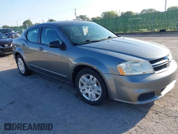 2013 Dodge Avenger SE with VIN 1C3CDZAB6DN590997, listed as a IAAI auction lot 43301503 with 176,151 mi miles and . Bid and sale history available at DreamBid. Image 1.
