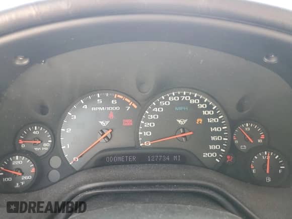 2002 Chevrolet Corvette с VIN 1G1YY22G725112830, выставлен на аукционе Copart как лот 61101095 с пробегом 127 734 миль миль и Списание • Salvage title. История ставок и продаж доступна на DreamBid. Изображение 9.