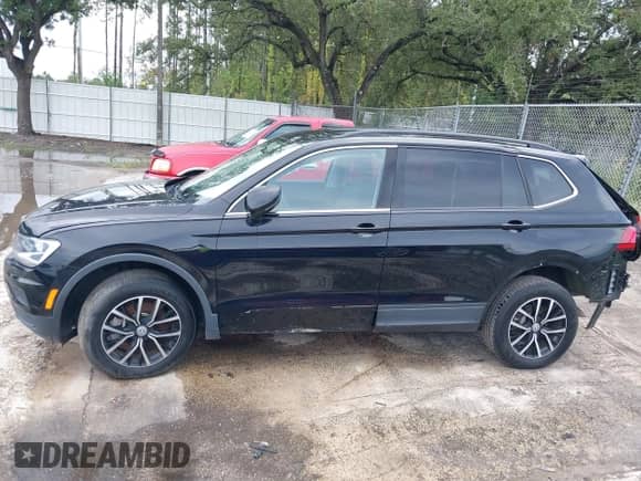 2021 Volkswagen Tiguan SE с VIN 3VV2B7AXXMM058256, выставлен на аукционе IAAI как лот 43250700 с пробегом 33 409 миль миль и . История ставок и продаж доступна на DreamBid. Изображение 14.