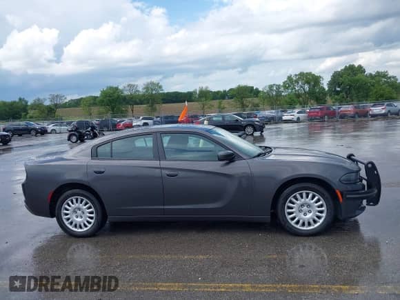 2020 Dodge Charger Police z VIN 2C3CDXKT1LH127507, wystawiony jako IAAI lot #42608659 z przebiegiem 137 391 mil mil oraz . Historia ofert i sprzedaży dostępna na DreamBid. Obrazek 13.