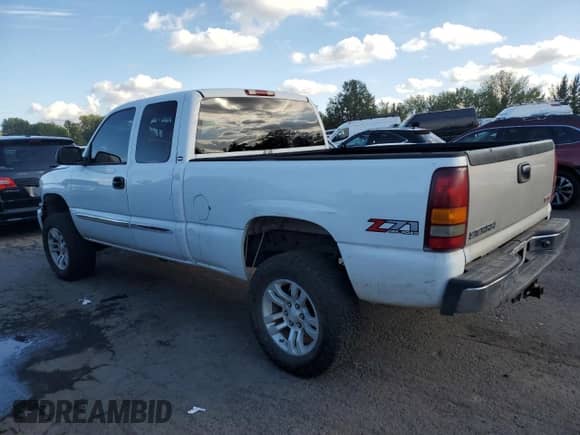 2003 GMC Sierra 1500 SLT z VIN 2GTEK19T731335445, wystawiony jako Copart lot #81689485 z przebiegiem Nie podano mil oraz Szkoda całkowita • Salvage title. Historia ofert i sprzedaży dostępna na DreamBid. Obrazek 2.