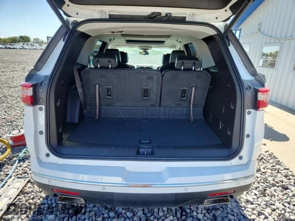 2020 Chevrolet Traverse Premier z VIN 1GNEVKKW0LJ100853, wystawiony jako Copart lot #85935815 z przebiegiem 94 164 mil mil oraz Szkoda całkowita • Salvage title. Historia ofert i sprzedaży dostępna na DreamBid. Obrazek 6.