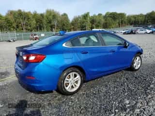 2018 Chevrolet Cruze LT с VIN 1G1BE5SM6J7139817, выставлен на аукционе Copart как лот 82102395 с пробегом 90 330 миль миль и Списание • Salvage title. История ставок и продаж доступна на DreamBid. Изображение 3.