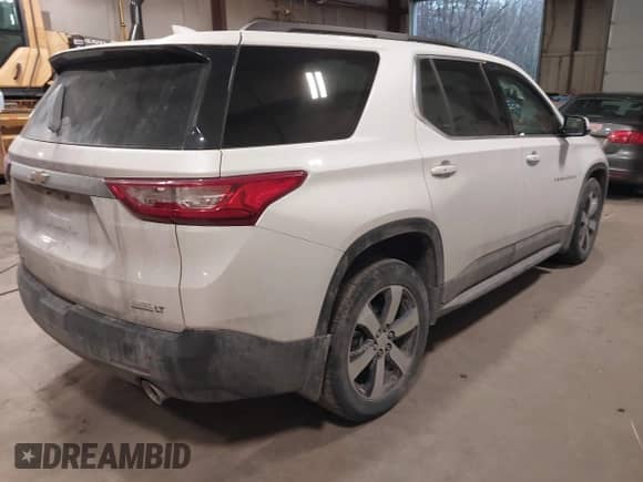 2019 Chevrolet Traverse LT with VIN 1GNEVHKW8KJ188245, listed as a IAAI auction lot 41947201 with 109,927 mi miles and . Bid and sale history available at DreamBid. Image 4.