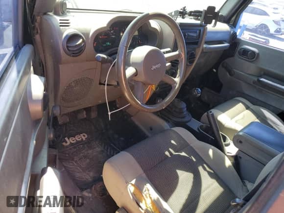 2007 Jeep Wrangler X с VIN 1J4FA24167L149456, выставлен на аукционе Copart как лот 82495595 с пробегом 119 257 миль миль и Списание • Salvage title. История ставок и продаж доступна на DreamBid. Изображение 8.