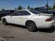 1996 Lexus SC 400 z VIN JT8CH32Y0T0051222, wystawiony jako Copart lot #65195245 z przebiegiem 138 876 mil mil oraz Szkoda całkowita • Salvage title. Historia ofert i sprzedaży dostępna na DreamBid. Obrazek 2.