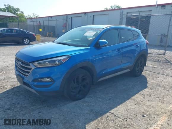 2018 Hyundai Tucson Sport z VIN KM8J3CAL1JU723786, wystawiony jako IAAI lot #42555495 z przebiegiem 145 454 mil mil oraz . Historia ofert i sprzedaży dostępna na DreamBid. Obrazek 2.