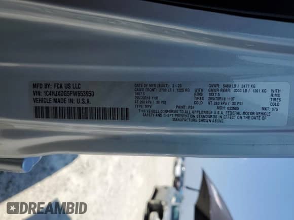 2023 Jeep Wrangler Willys with VIN 1C4HJXDG5PW653950, listed as a Copart auction lot 61857165 with 19,633 mi miles and Salvage title. Bid and sale history available at DreamBid. Image 13.