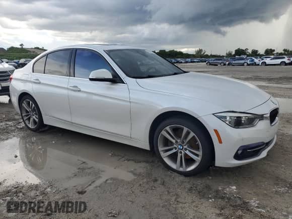 2018 BMW 3 Series 330i with VIN WBA8B9G53JNU97498, listed as a Copart auction lot 80642615 with 84,952 mi miles and Salvage title. Bid and sale history available at DreamBid. Image 4.